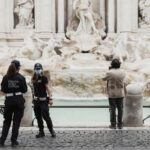 tourists-carve-names-trevi-fountain-rome